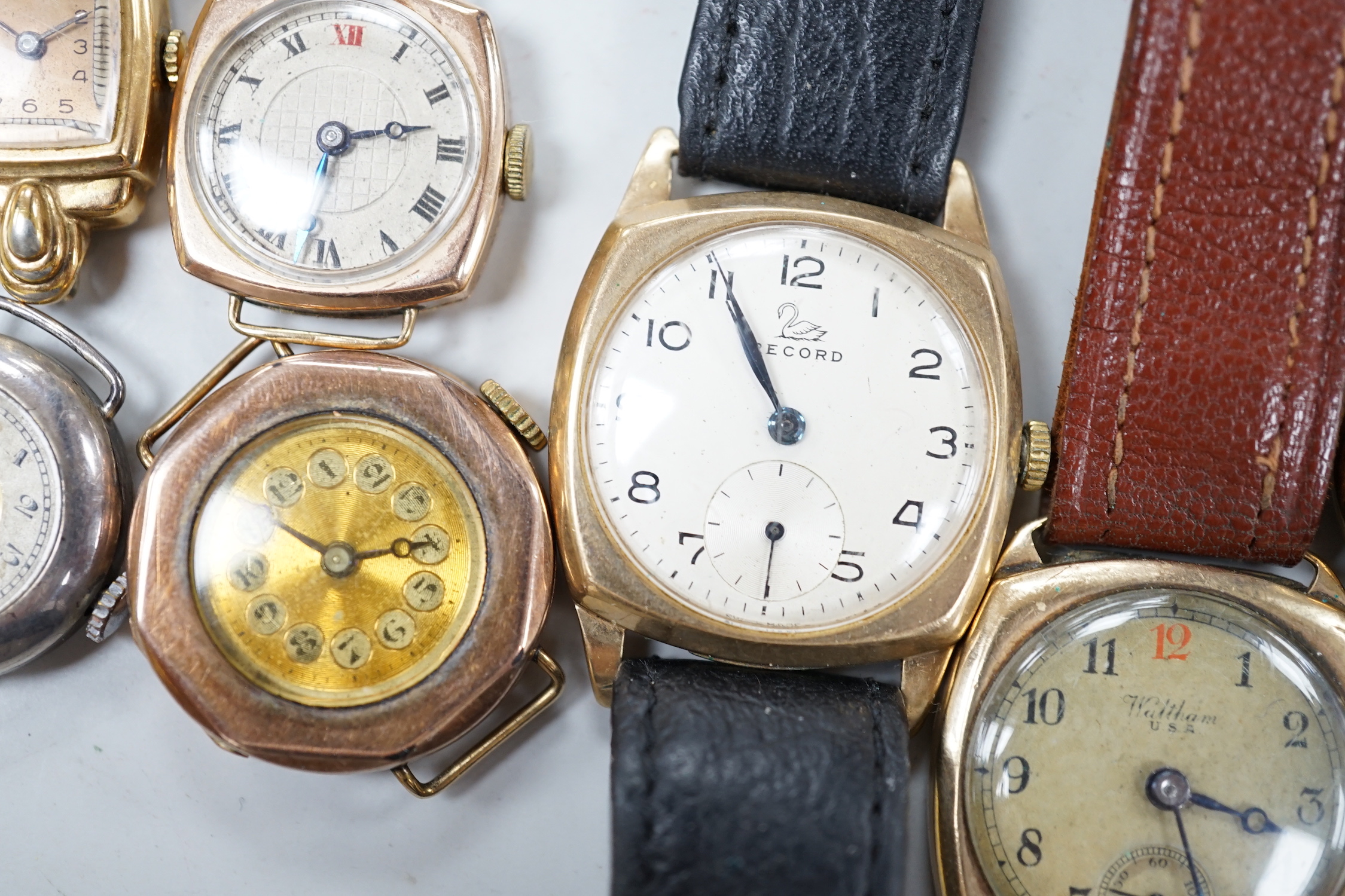Five assorted 9ct gold lady's or gentleman's manual wind wrist watches, including Waltham, Record & Derrick and three other wrist watches.
